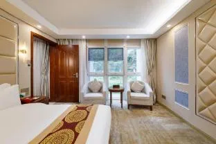 Xinrun Hua Hotel - Guangming City Station Hongqiao Park Branch