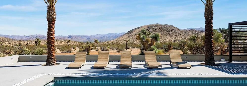 Iconic 6BR Desert Retreat w/ Pool, Pickleball & Fire Pit Joshua Tree Masion by Avantstay