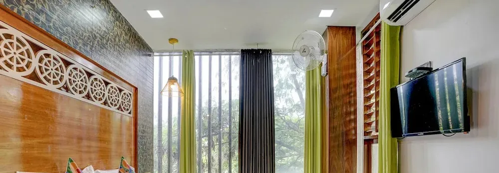 FabHotel Vardhan House I