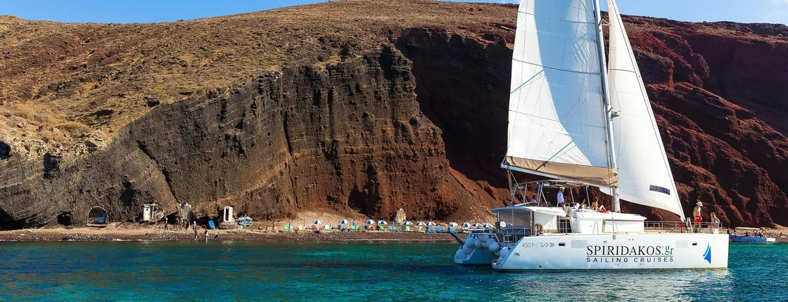 Santorini classic catamaran cruise with pick-up, lunch and drinks