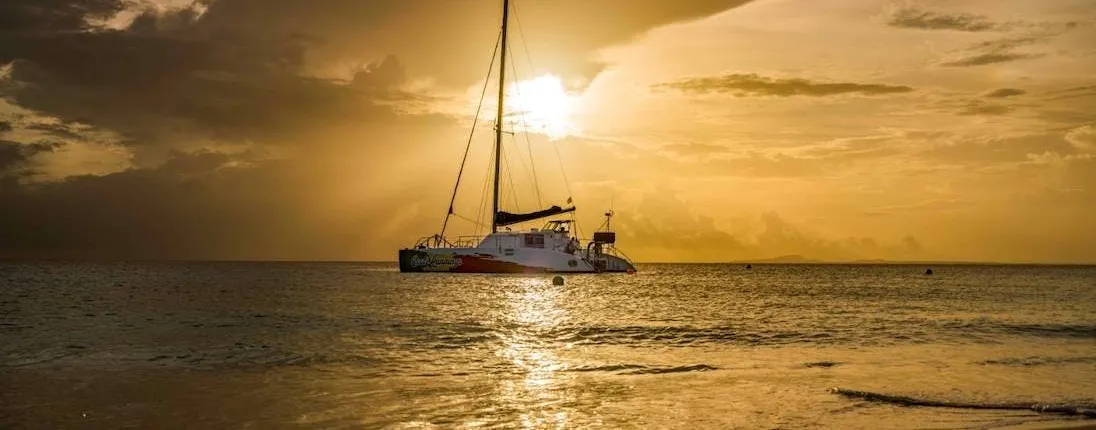 Irie catamaran sailing experience at sunset