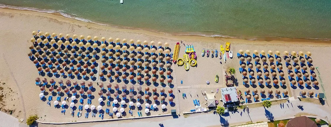 Watersports and beach fun at St Nick's Beach with optional transfers