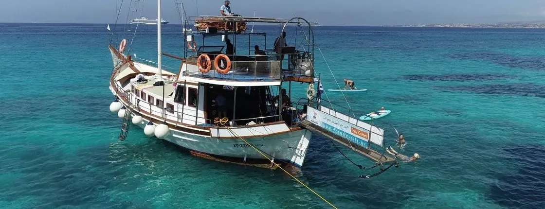 Azure cruise in Kefalonia with hidden beaches, Greek lunch and optional transfer