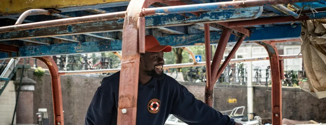 Canal cruise on a wooden refugee boat