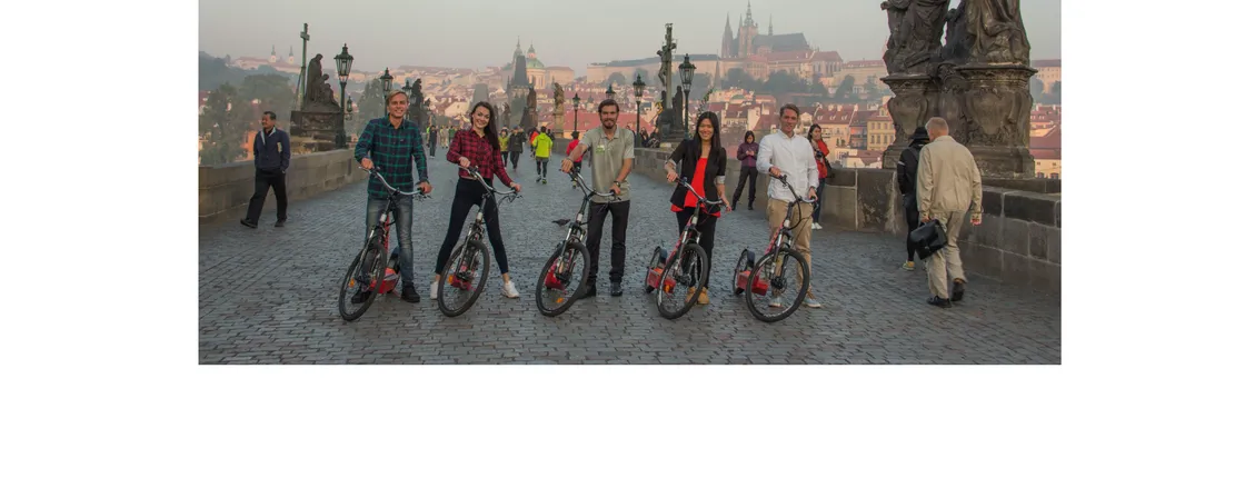 Small group e-scooter viewpoints tour with a pickup in Prague