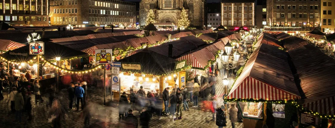 Guided tour of Nuremberg's Christmas market with street theatre