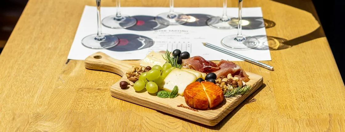 Porto Wine Tasting Experience with Portuguese Cheese and Ham Plate