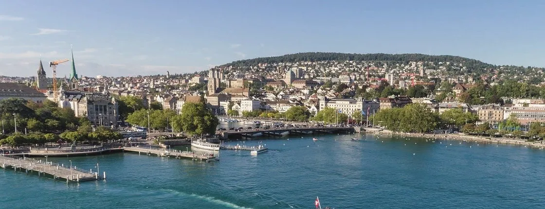 Zurich guided bus tour with lake cruise and optional FIFA Museum entry
