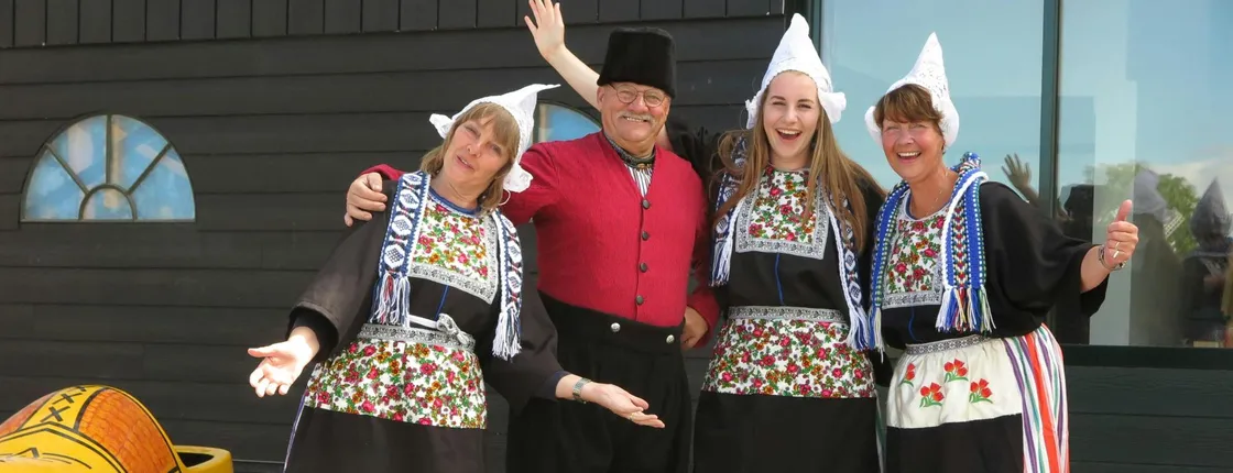 Picture in Volendam costume with cheese and clog tour