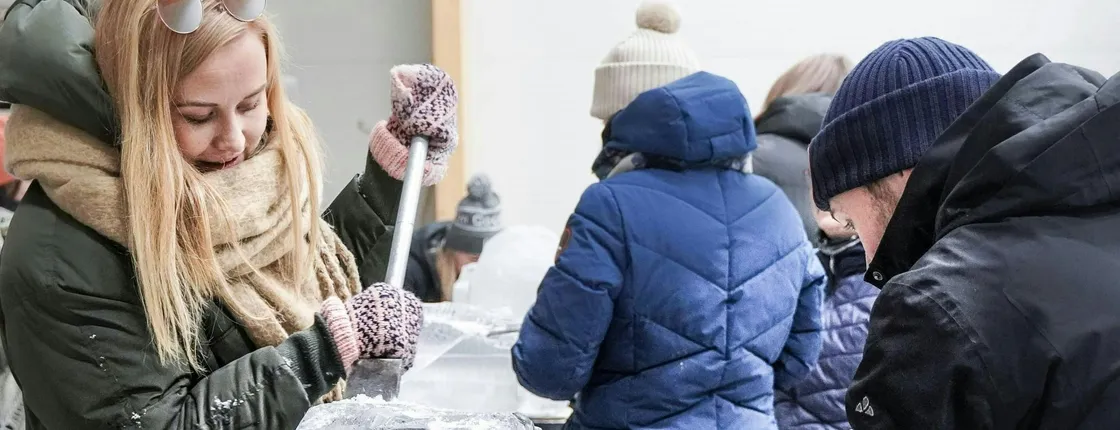 Ice sculpting workshop and dinner by the fire in Rovaniemi