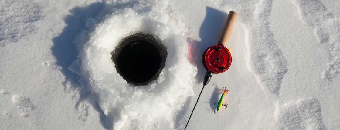 Ice fishing on lake Sirkkajärvi from Levi