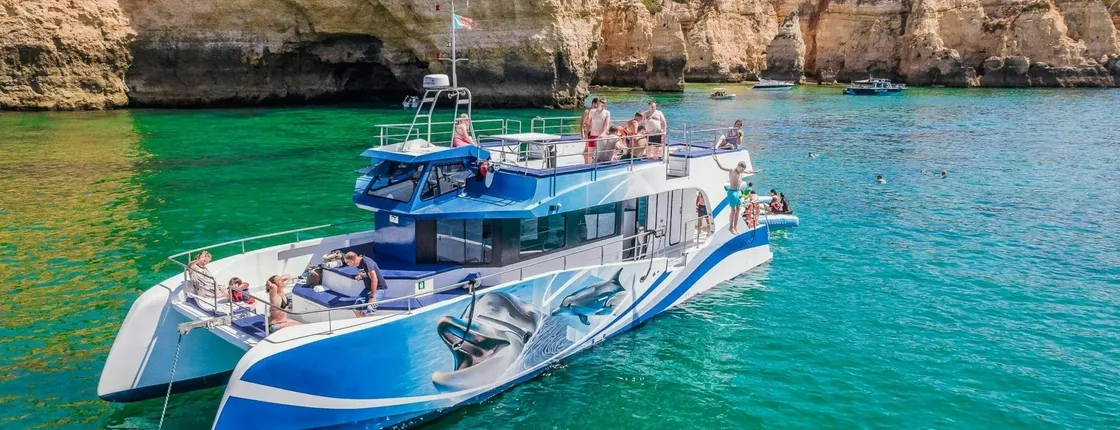 Vilamoura dolphins and Benagil caves catamaran cruise