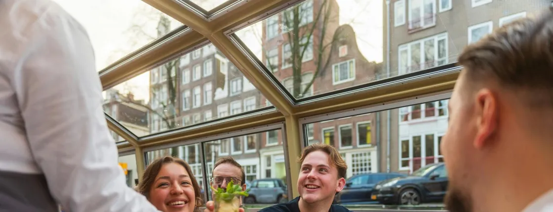 Evening cocktail cruise in Amsterdam