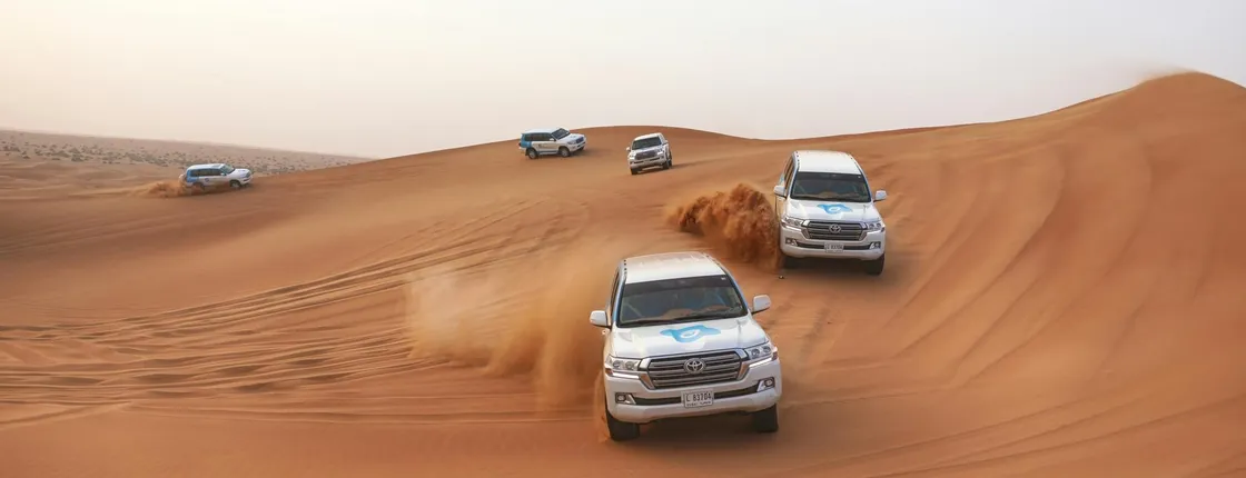 Dubai morning desert safari with dune bashing, sandboarding, camel ride