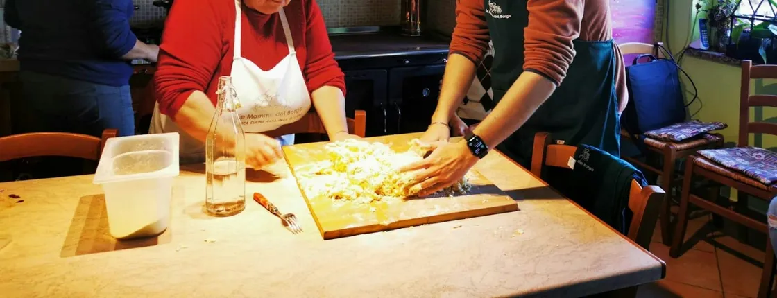 Private Cooking Class with Le Mamme del Borgo with Transfer from Taormina