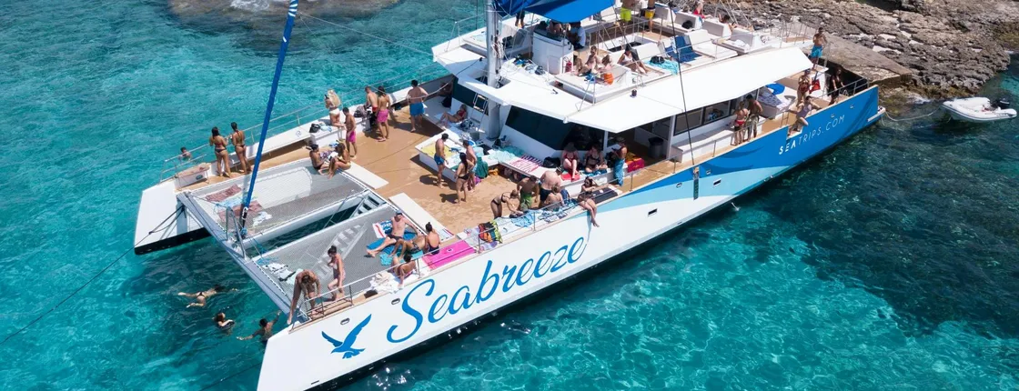 Beaches and bays catamaran sunset tour in Malta