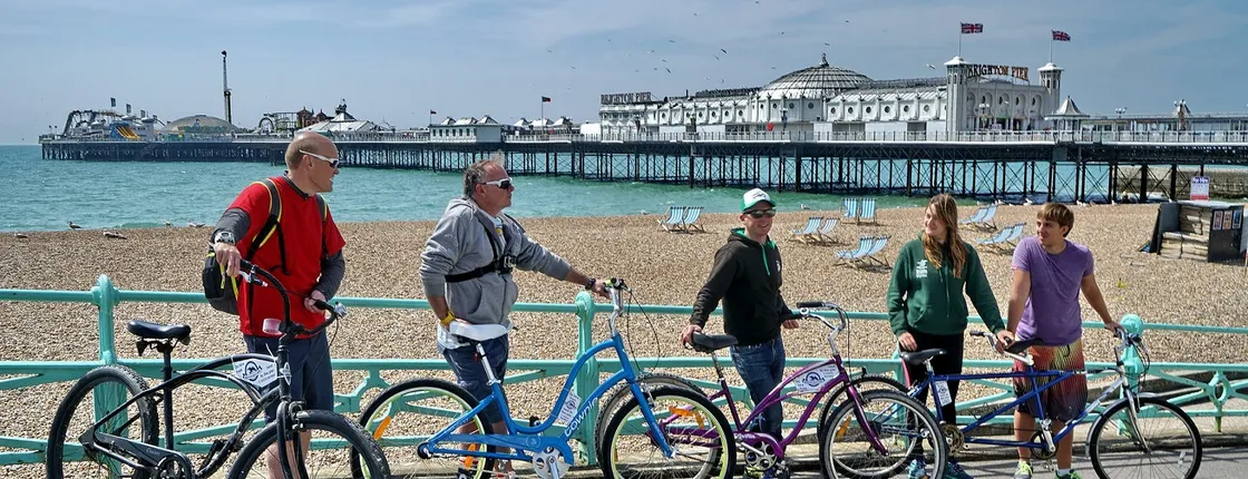 Cycle along the beachfront with Brighton Beach Bikes hire