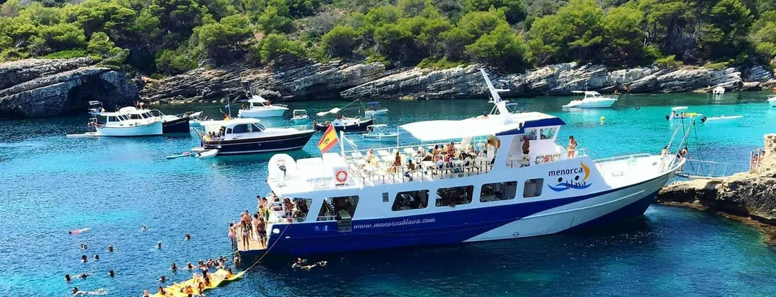South-west Menorca cruise with paella lunch and Transfer