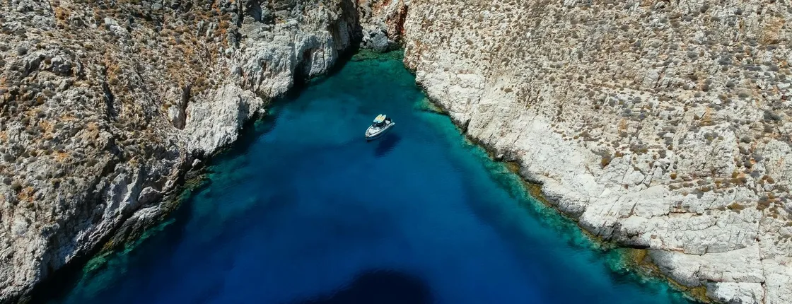 Hidden-caves motor yacht cruise in Crete