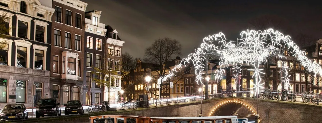 Amsterdam Light Festival canal cruise on a luxury boat with drinks