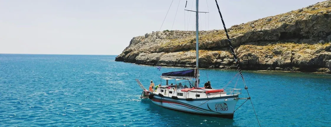 Private sailboat bay‑to‑bay day trip from Lindos
