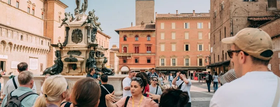 Guided tour of Bologna's iconic landmarks and squares with Tower