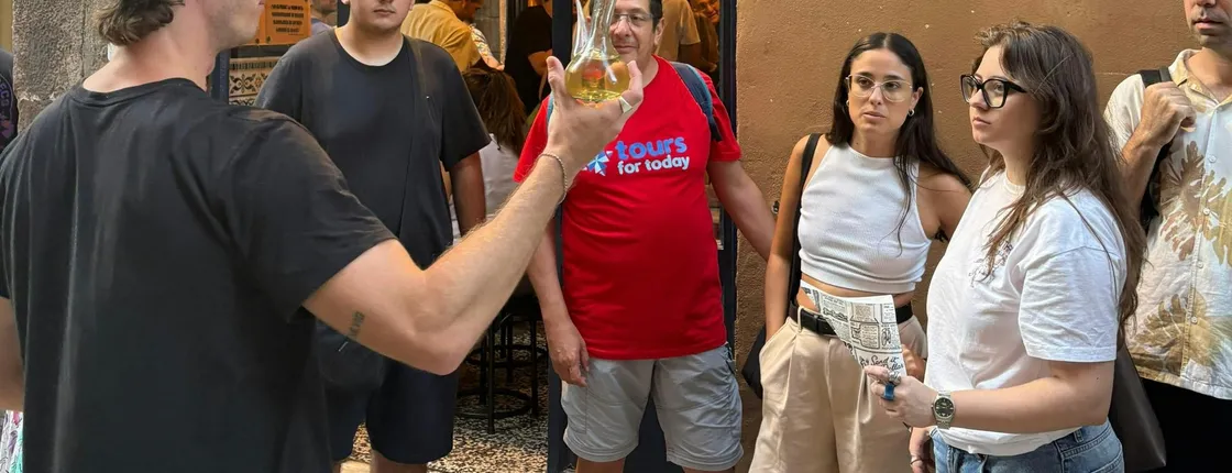Barcelona district tour with traditional tapas tasting