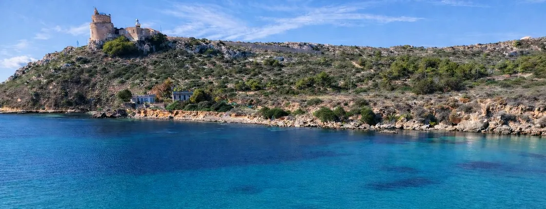 Cagliari small-group boat escape to Sella del Diavolo with swim stops