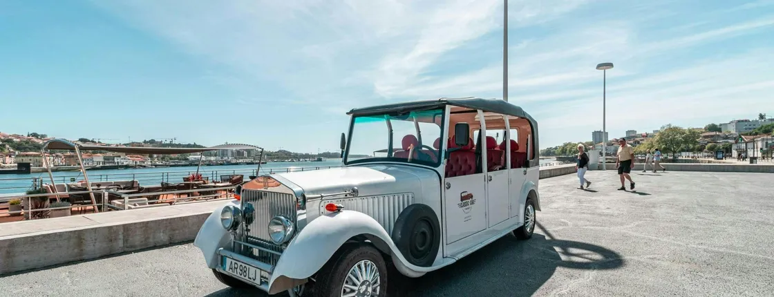 Electric vehicle tour of Porto with wine tasting and river cruise