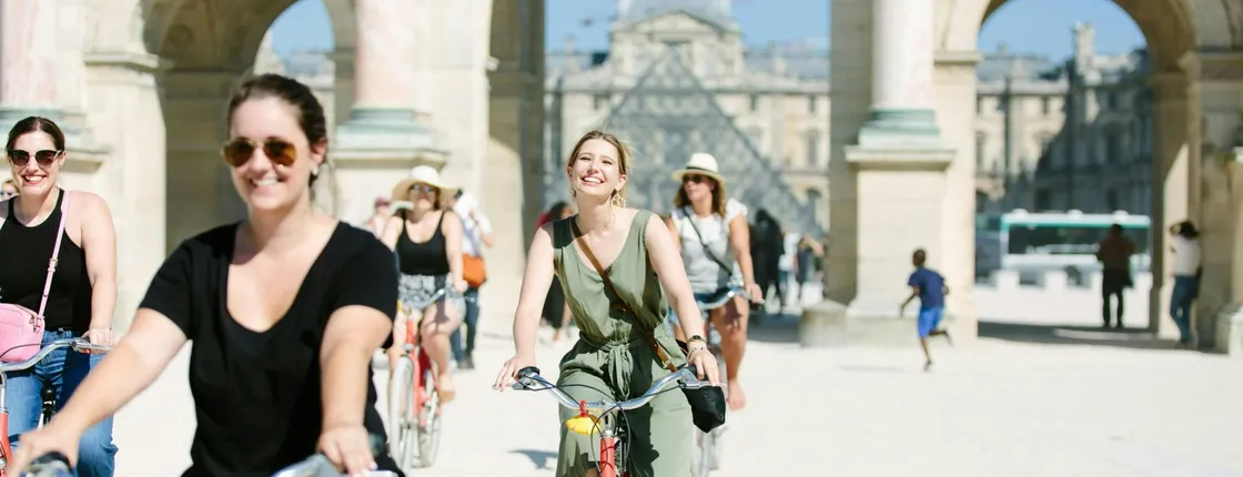 Paris highlights bike tour and Seine river cruise
