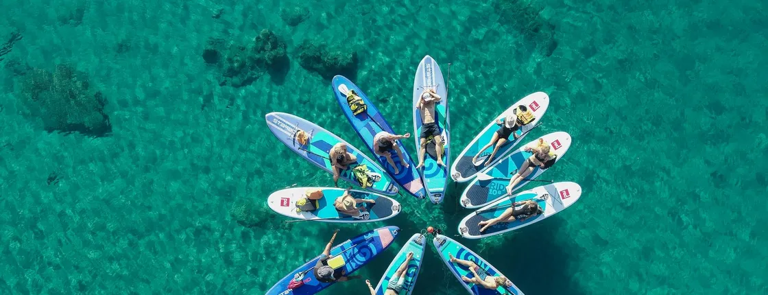 Small-group coastal SUP experience with sea caves and snorkelling