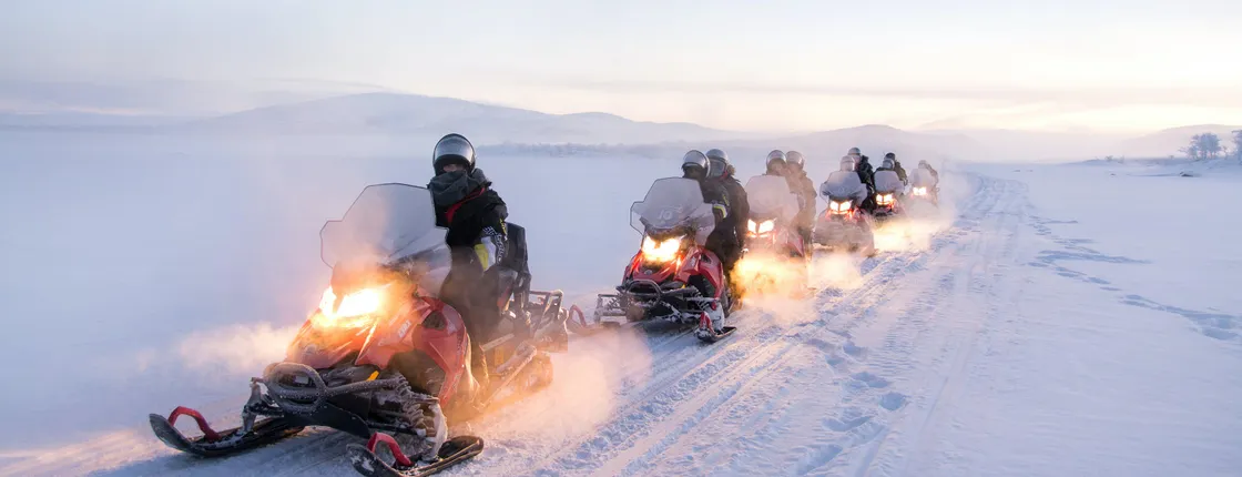 Lapland snowmobile adventure to 3-country border from Tromsø