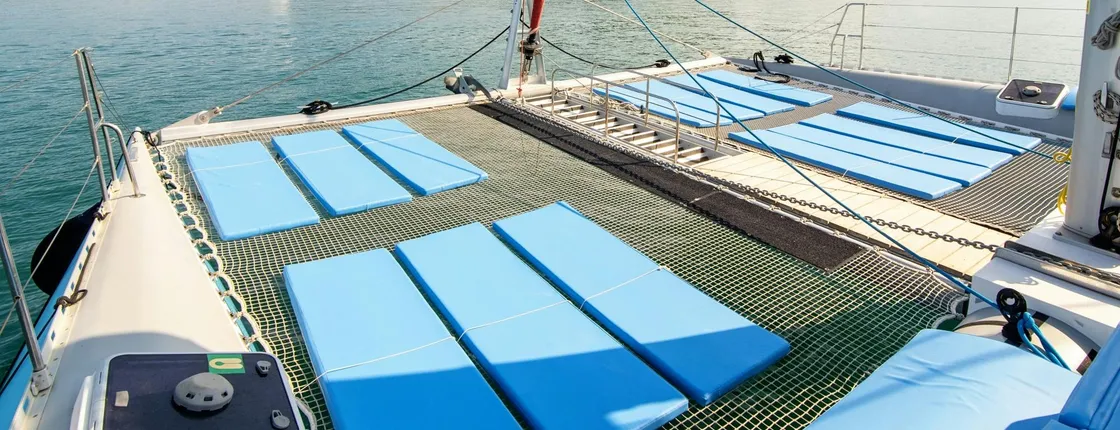 Corfu east coast catamaran cruise with drinks, meal and optional transfers