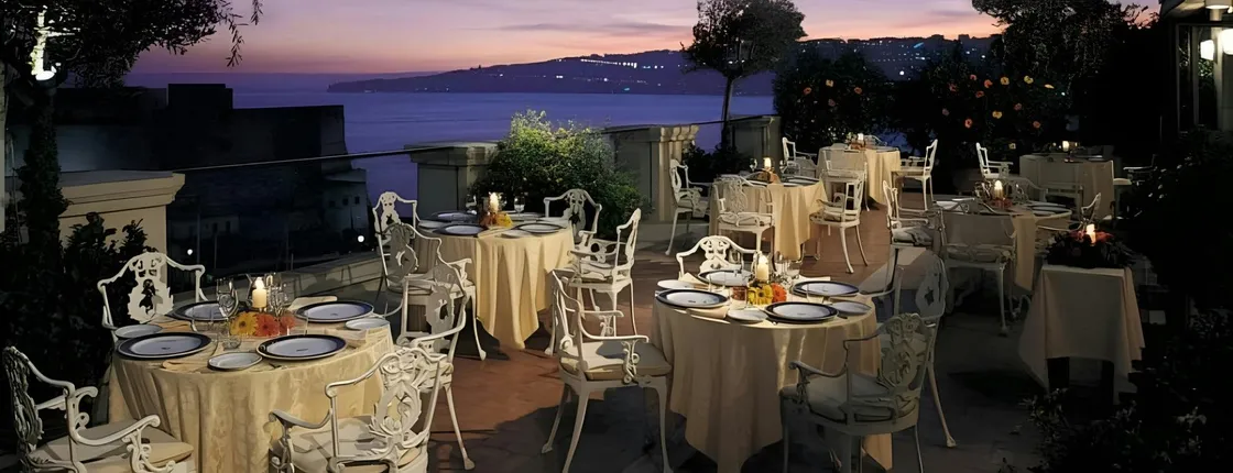 Romantic candlelit dinner on a panoramic terrace in Naples
