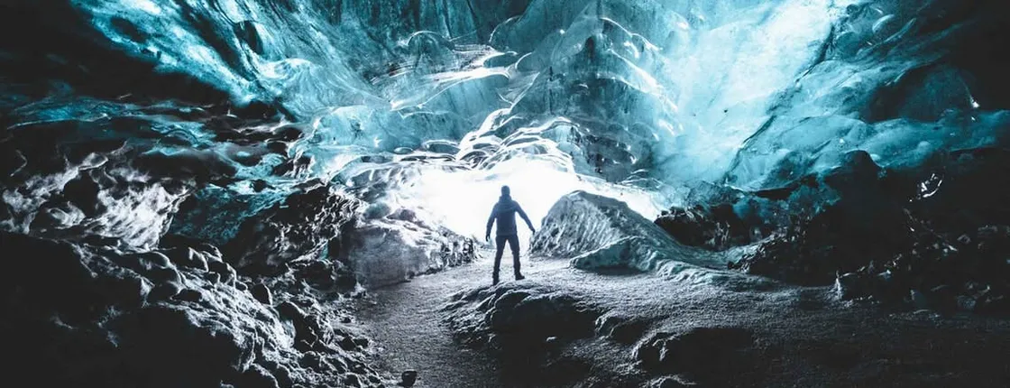 Explore a blue ice cave