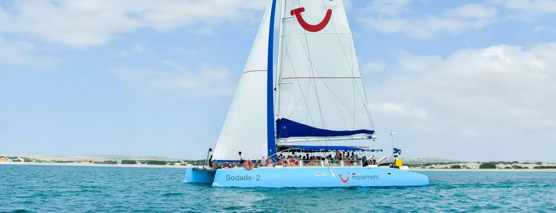 Sunset catamaran cruise with live music and open bar