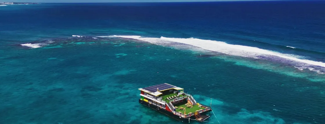Poko Loko floating bar experience at sunset