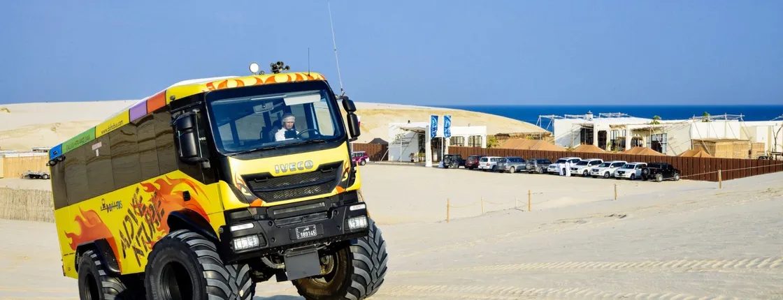 Monster bus tour in the desert with Al Majles Resort day pass