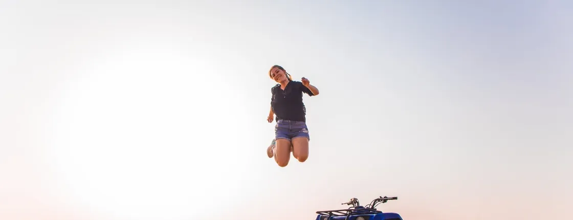 Single quad ride in Dubai Desert with sandboarding, camel ride and BBQ