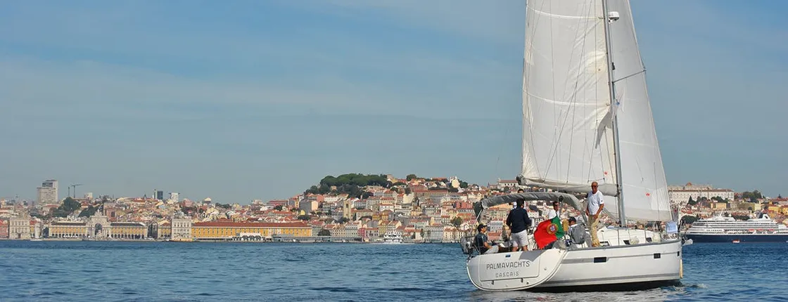 Lisbon old town sailing cruise with a welcome drink