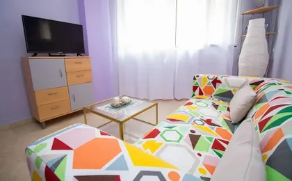 Central Colorful Flat with Parking