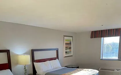 Apm Inn & Suites