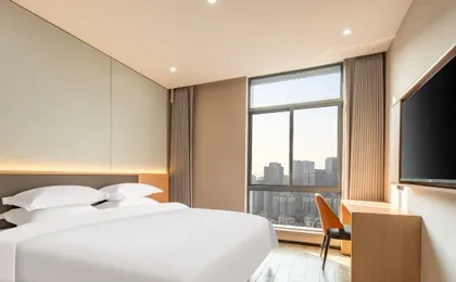 Hangzhou Nuomeihua Business Hotel (Shengtangyang Commercial Complex)