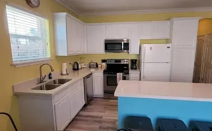 Brand New Inside 1/2 Block to Beach Fun Pool 2 Bedroom Home by Redawning