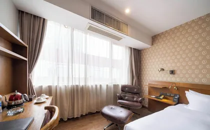 Xingyi Chain Hotel Jiangxia Metro Station