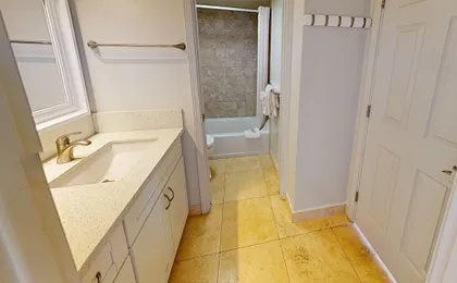 Waikiki Banyan High Level Condo with Ocean Views from the Private Lanai