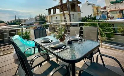 Red Harmony by the Sea Pool And Balcony