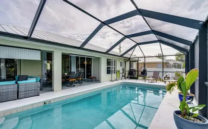 Poolside Lounge & Game Area: Cape Coral Retreat
