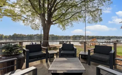Lake Norman Lakefront w/ Private Beach, Dock, Hot Tub & Fire Pit Sandy Shore by Avantstay