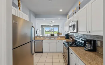 Asiago Vacation Rental at Lely Resort. Newly Furnished 2-Bedroom Condo with Stunning Lake & Golf Vi